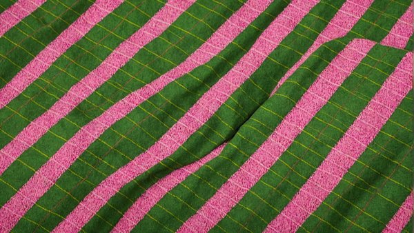 Plaid rose et vert : confort et style éco-responsables